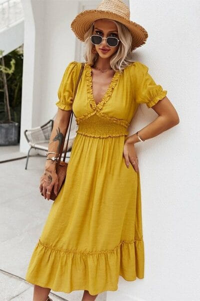 Vestido boho amarillo con cuello en V foto 1