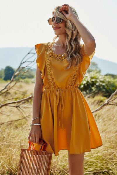 vestido bohemio corto elegante amarillo